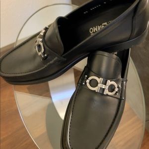 All black Ferragamo loafers